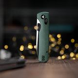 Sabretooth-GM Crossbar Lock Folding Pocket Knife,3.4'' 14C28N Steel Black Stonewashed Satin Blade, Green Micarta Handle